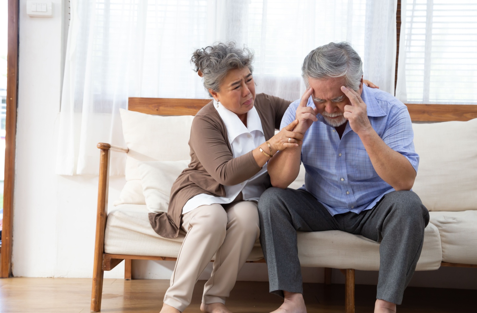 An older man has difficulty recalling memories while his wife tries to help him with his memory loss.